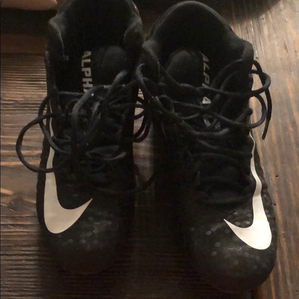 Nike Alpha Menace football cleats. Boys. 7.5